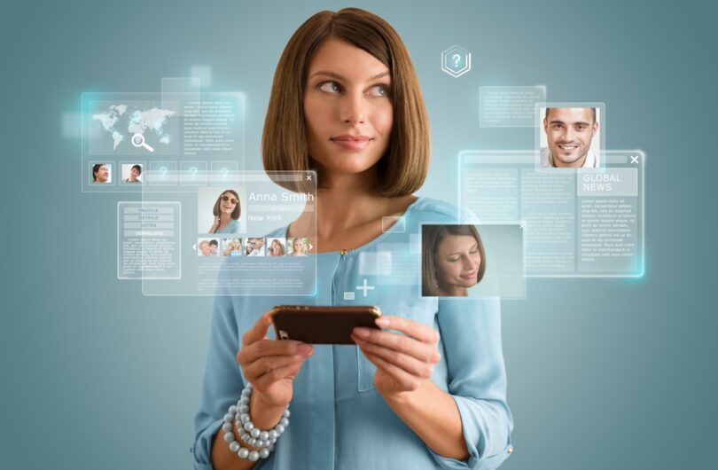 Pretty,Modern,Woman,Using,Her,Smartphone,And,Virtual,Interface,To
